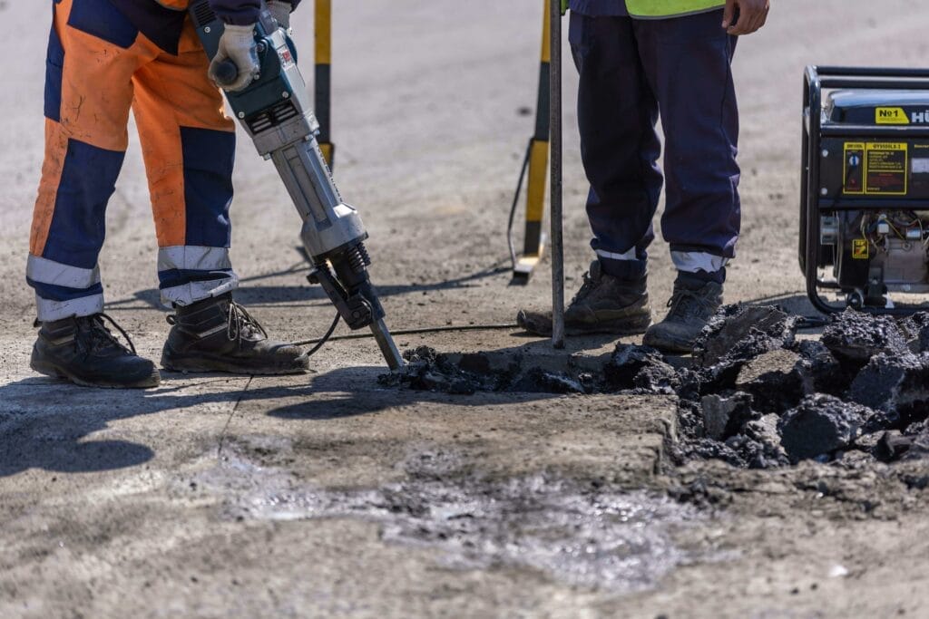 men working on cement